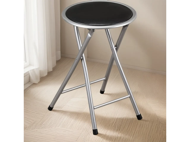 Descripcion: Composición: - 87% metal - 2% cloruro de polivinilo - 1% esponja - 10% tabla de particulas Estructura metal gris - tapizado negro Medidas:  - Diámetro 30 cm - Altura 45 cm Peso máximo soportado: 100 kg Medidas plegado: 75 x 35 x 10cm